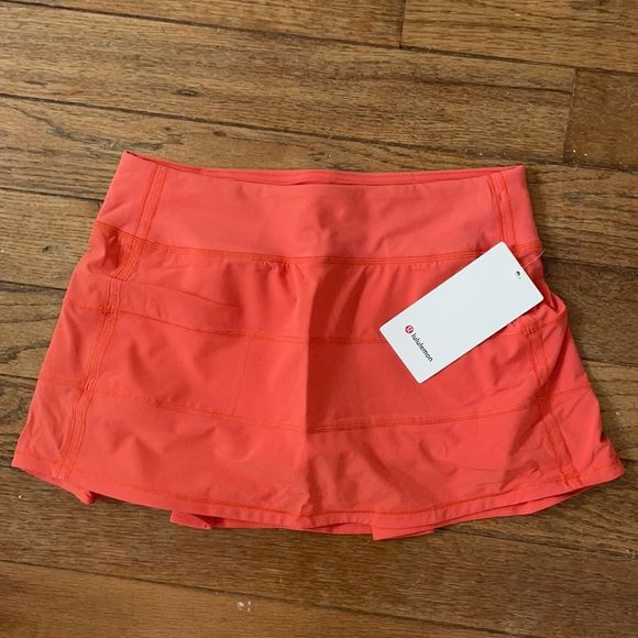 lululemon athletica Dresses & Skirts - NWT Lululemon Pace Rival Tennis Mid-Rise Skirt  WARM CORAL ORANGE Size 8 REGULAR